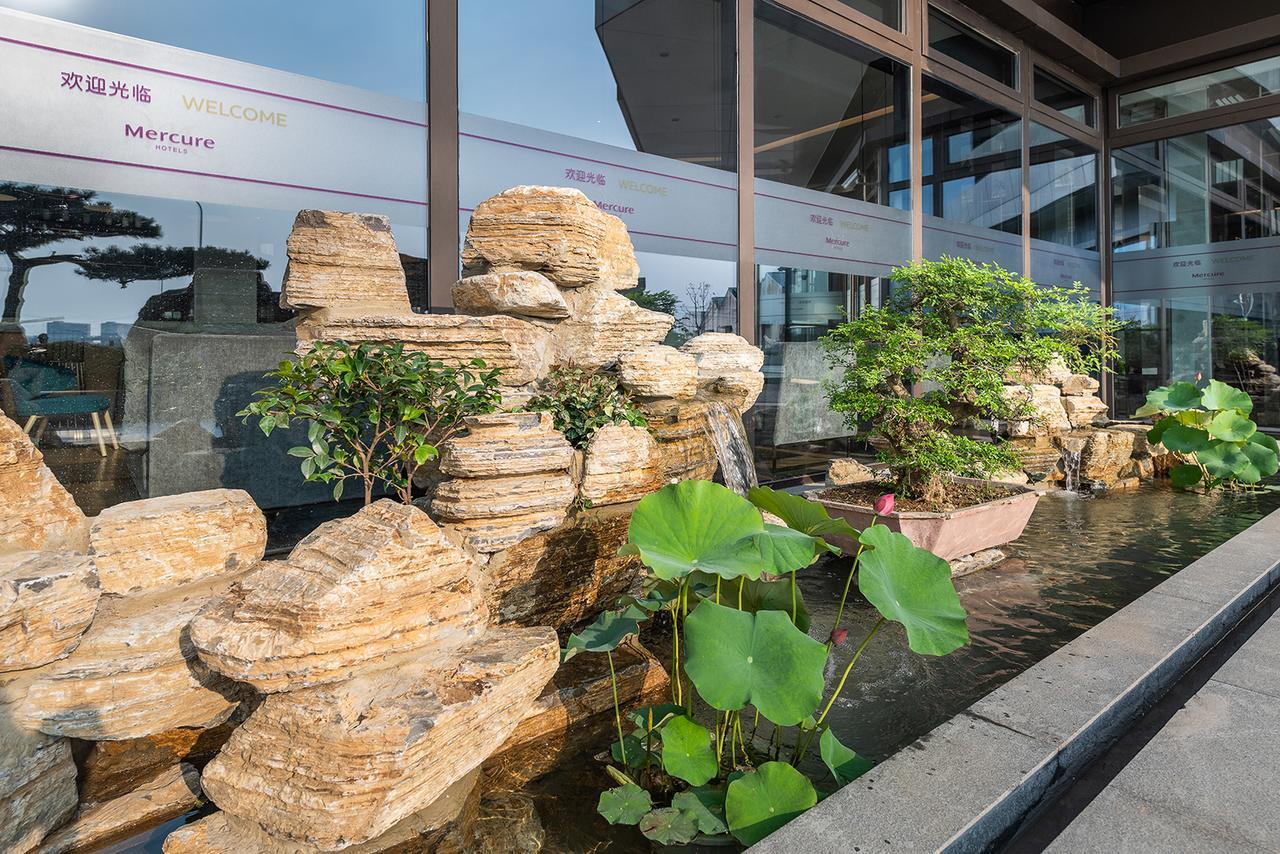 เมอร์เคียว เซี่ยงไฮ้ เอ็นอีซีซี Hotel Qingpu ภายนอก รูปภาพ